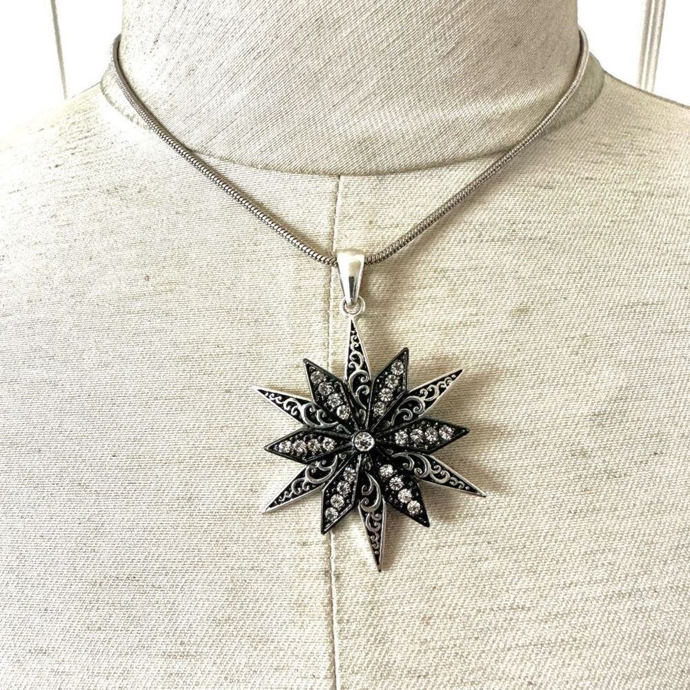 Silver tone rhinestone star pendant necklace